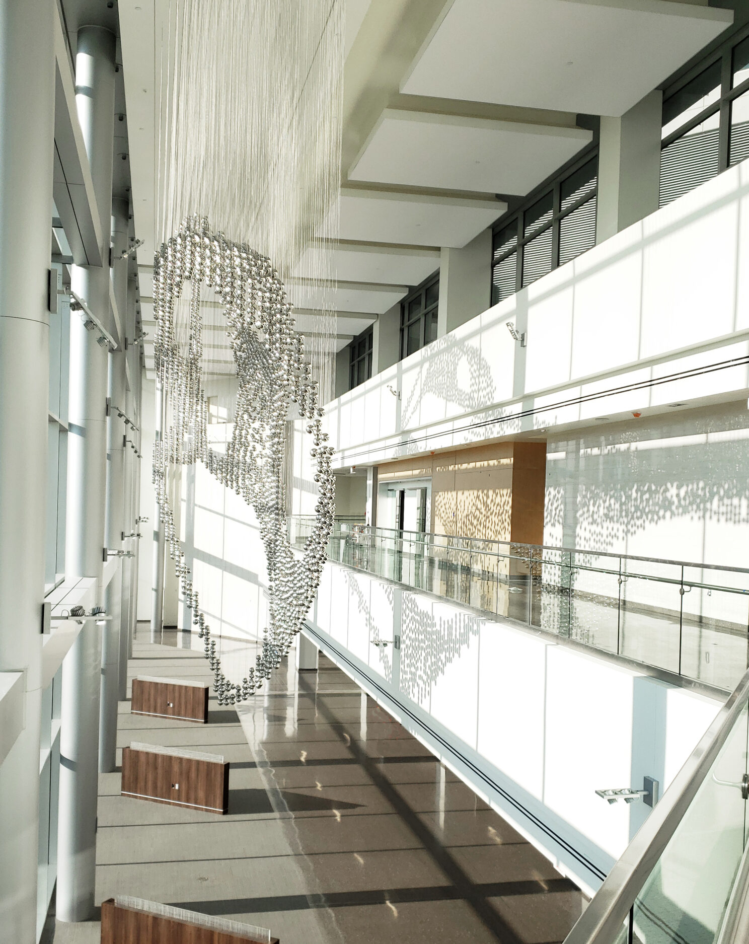 Installation photo of a suspended sculpture in Dallas Texas